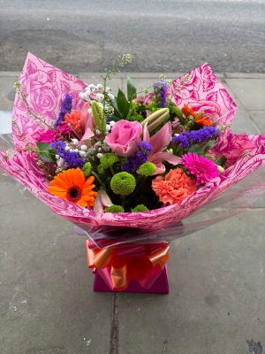 Orange cerise and purple hand tied