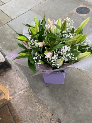 Pink and white lily hand tied