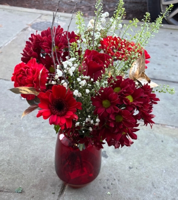 Red and gold vase arrangement