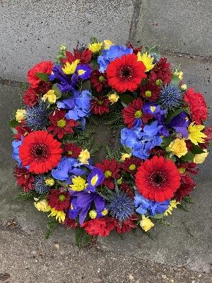 Red blue and yellow wreath