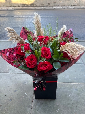Red roses with pampas grass
