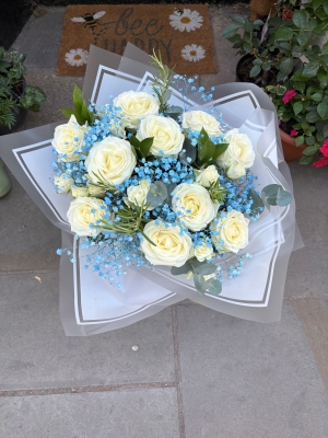 White roses and blue gyp bouquet