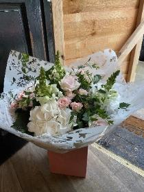 Hydrangea and rose hand tied