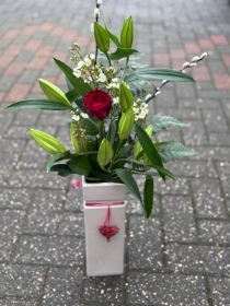 Lily and rose vase arrangement