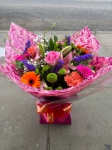 Orange cerise and purple hand tied