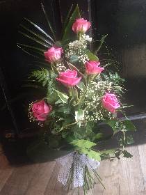Pink roses tied bouquet