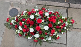 Red and white casket spray