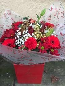 Red Xmas hand tied