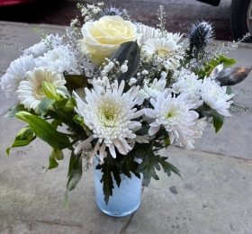 White and silver vase arrangement