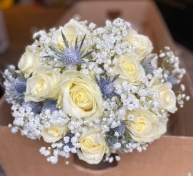 White rose, gyp and thistle wedding bouquet